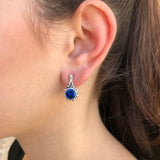 Sparkling 925 Sterling Silver Earrings with Round Created Blue Sapphire, a perfect token of devotion for September birthdays.