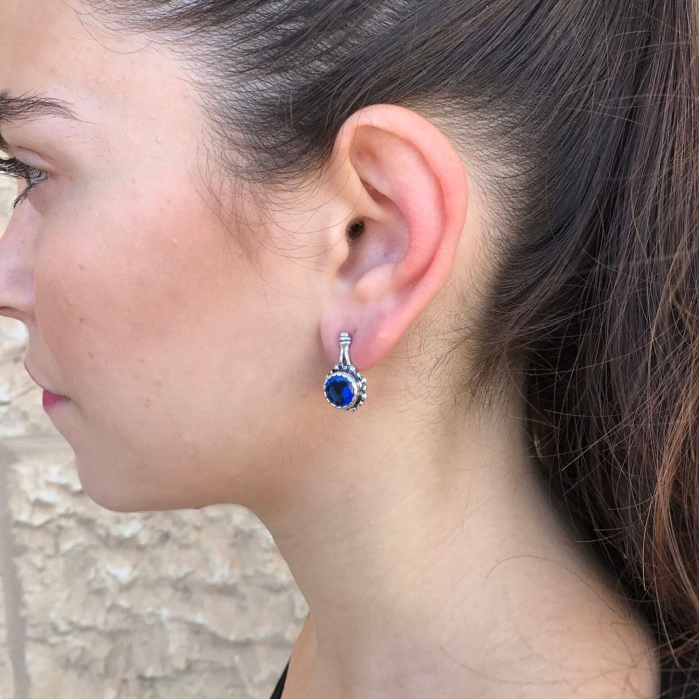 Elegant 925 Sterling Silver Sapphire Earrings featuring Round Created Blue Sapphire, perfect for birthdays and special occasions.