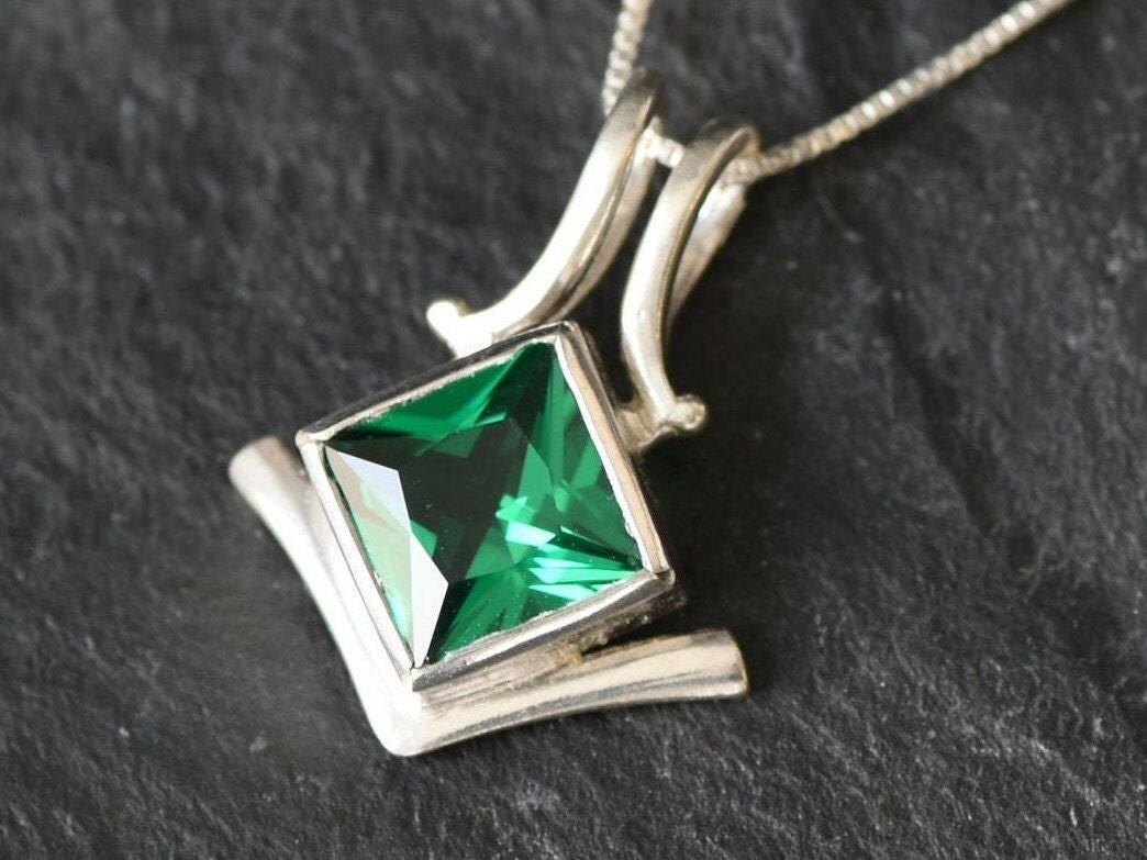 Elegant 925 Sterling Silver pendant featuring a square Created Green Emerald, perfect for May birthdays and special occasions.