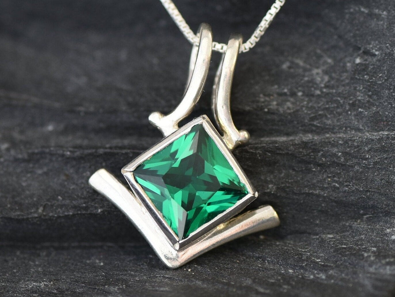 Elegant 925 Sterling Silver pendant featuring a square Created Green Emerald, perfect for May birthdays and special occasions.