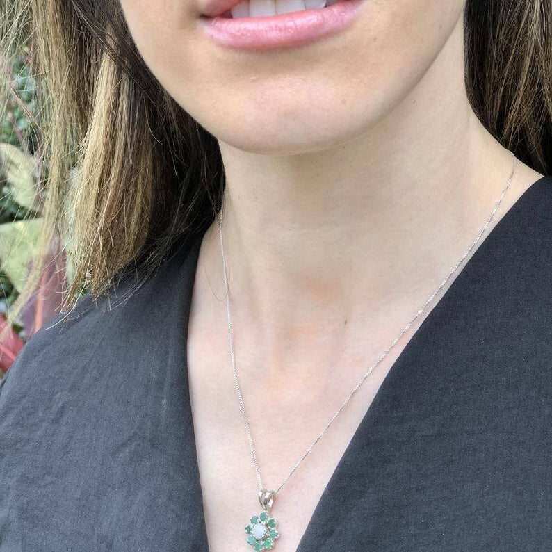 Elegant 925 Sterling Silver Emerald Pendant, featuring a cluster of round green emeralds; a May birthstone perfect for gifting.