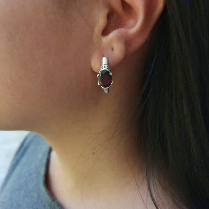 Luxurious created blue sapphire earrings in sterling silver, a timeless gift symbolizing truth and elegance for any celebration.