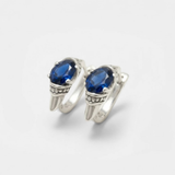 Created Sapphire Earrings made in 925 Sterling Silver with Oval Created Blue Sapphire in Solitaire setting, September Birthstone gift idea, symbolizes sincerity, truth, and faithfulness, ideal for everyday wear and perfect for birthday gifting and special occasions.