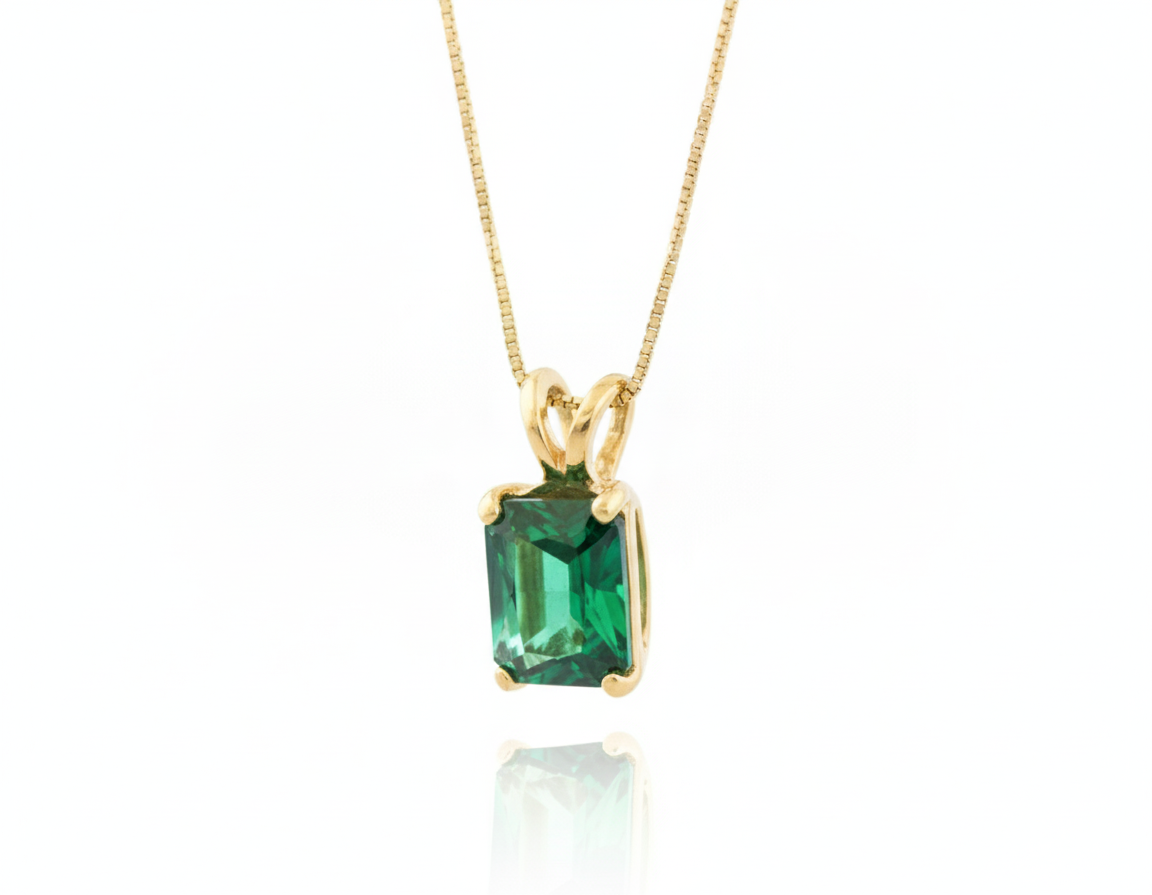 Sleek 18k Gold Vermeil emerald pendant with a vibrant created green emerald, ideal for casual wear and memorable gifts.