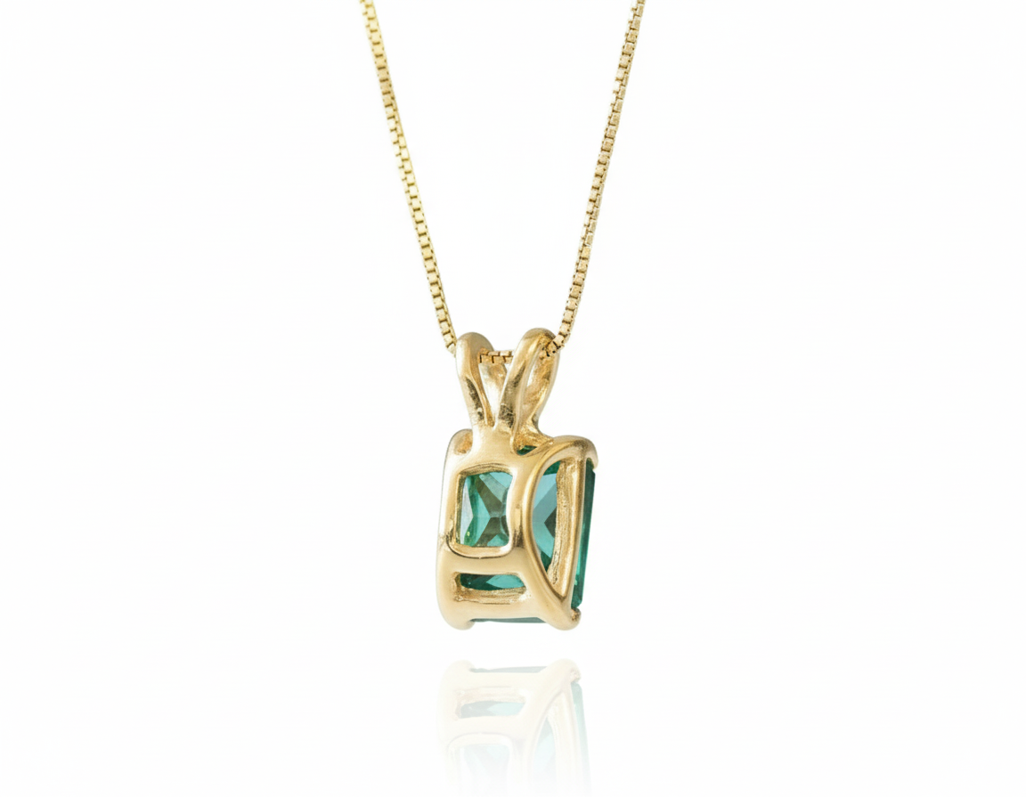 Stunning created emerald pendant in 18k gold vermeil, a timeless piece perfect for everyday elegance and meaningful gifts.