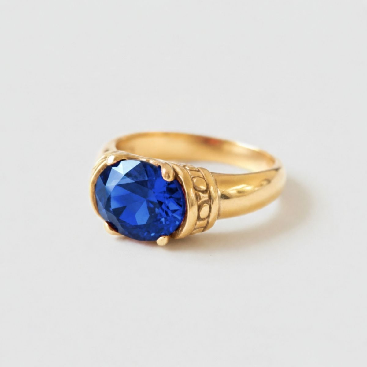 Created Sapphire Ring made in 18k Gold Vermeil with Oval Created Blue Sapphire in Solitaire setting, September Birthstone gift idea, symbolizes sincerity, truth, and faithfulness, ideal for everyday wear and perfect for birthday gifting and special occasions.
