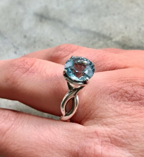 Elegant 925 Sterling Silver ring featuring a stunning Round Created Green Emerald, perfect for May birthdays and special occasions.