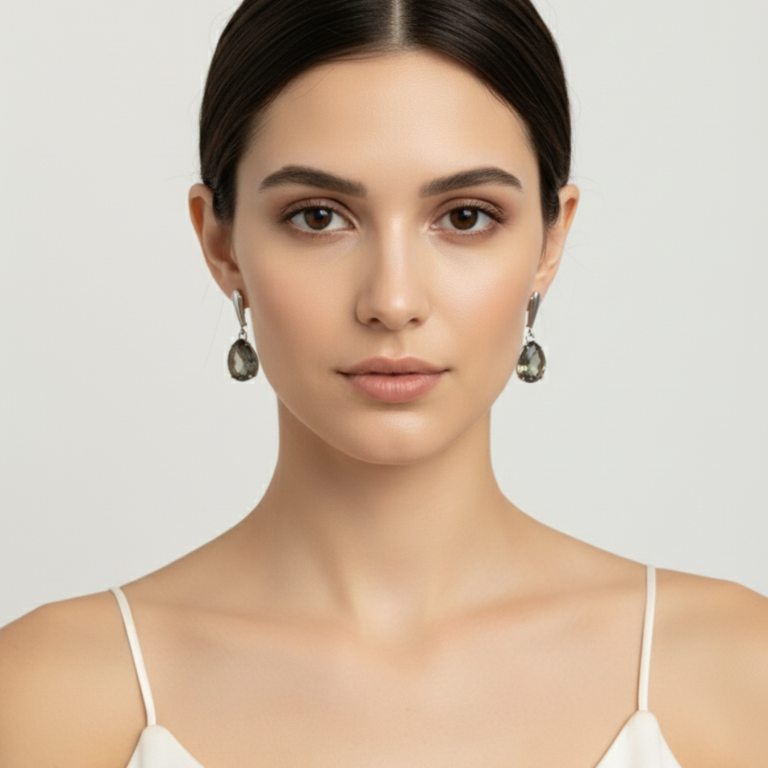 Chic Pear-Shaped Green Diamond Earrings in 925 Sterling Silver. Great for everyday elegance and memorable gifts.