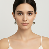 Chic Pear-Shaped Green Diamond Earrings in 925 Sterling Silver. Great for everyday elegance and memorable gifts.