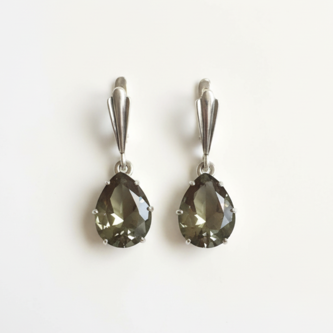 Luxurious 10 Carat Green Diamond Teardrop Earrings in Solid 925 Sterling Silver. Perfect for any occasion or special gift.