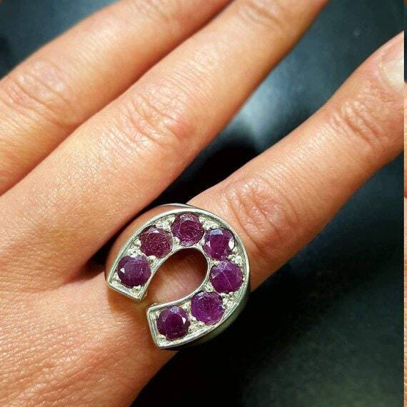 Elegant 925 Sterling Silver ring featuring a round Natural Emerald, symbolizing harmony and perfect for special occasions.