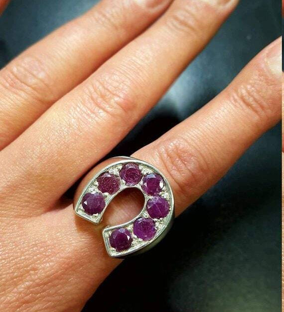 Elegant 925 Sterling Silver ring featuring a round Natural Emerald, symbolizing harmony and perfect for special occasions.