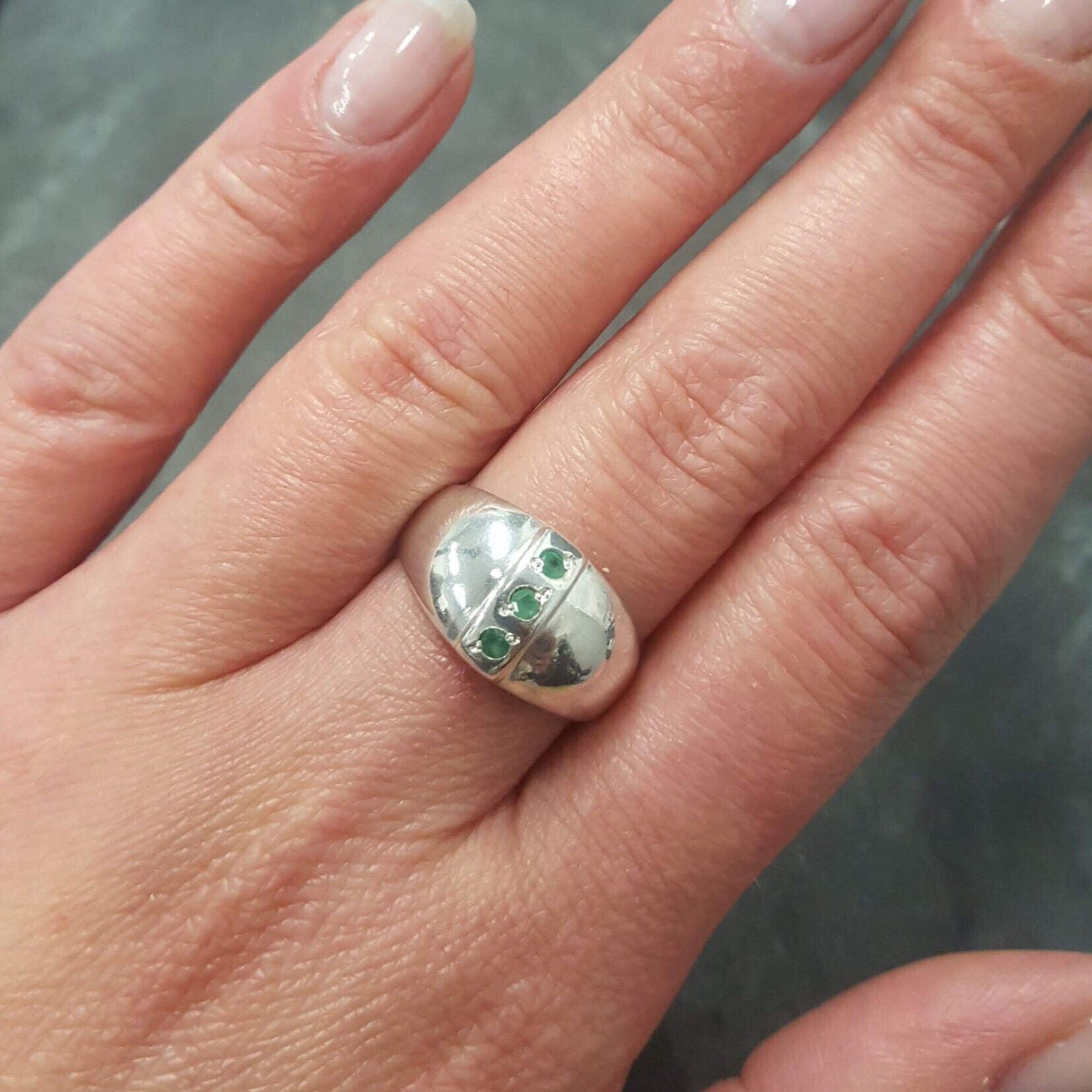 Elegant 925 Sterling Silver Ring featuring a captivating Round Natural Emerald, perfect for May birthdays and meaningful gifts.