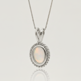Natural Fire Ethiopian Opal set in 925 Sterling Silver, a beautiful pendant symbolizing purity, great for every day and special events.