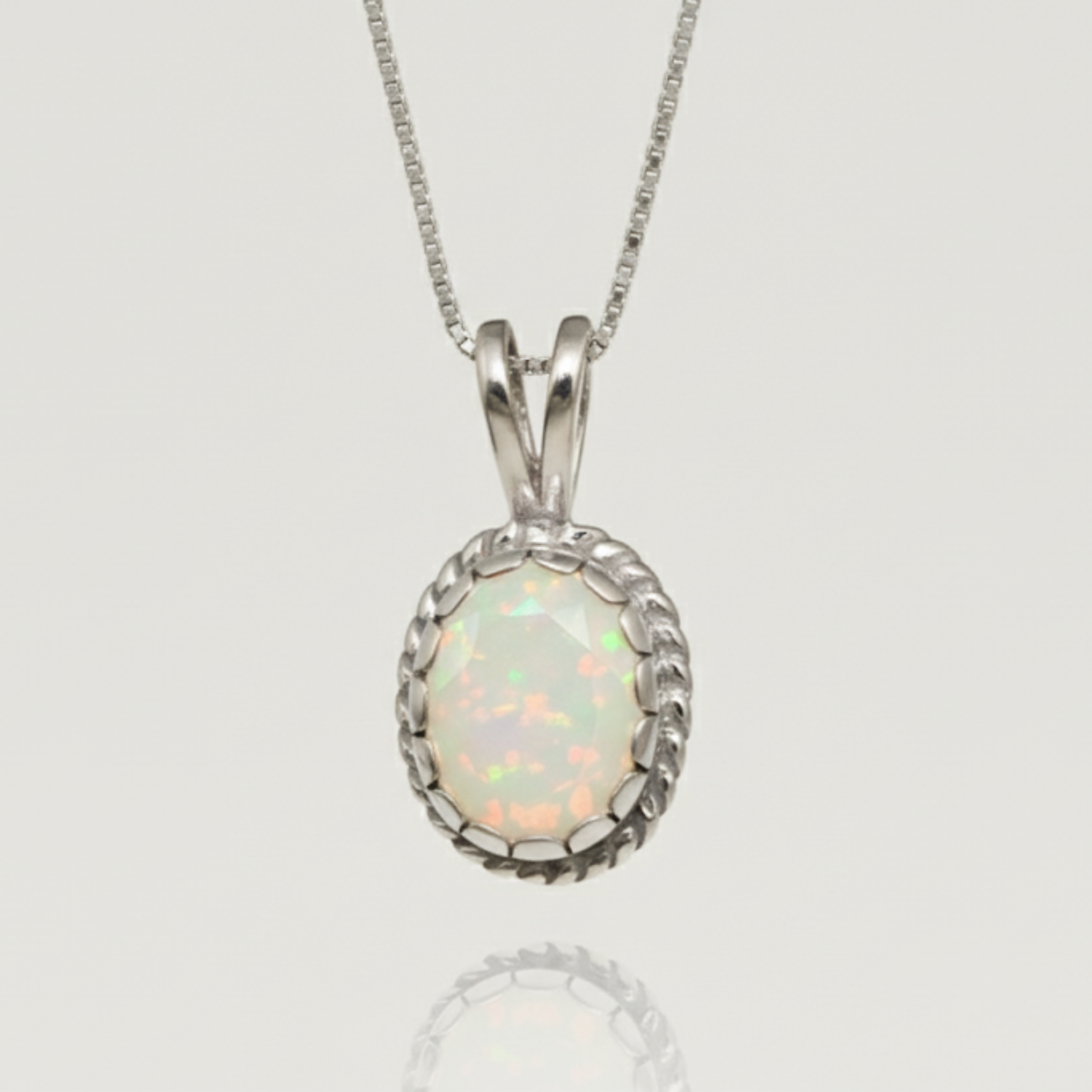 Natural Ethiopian Opal Pendant made in 925 Sterling Silver with Oval Natural Fire Ethiopian Opal in setting, October Birthstone gift idea, symbolizes hope, purity, and truth, ideal for everyday wear and perfect for birthday gifting and special occasions.