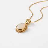 Stunning 18k Gold Vermeil pendant with a vibrant Oval Natural Fire Ethiopian Opal, a symbol of October birthstone charm.