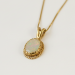 Beautiful 18k Gold Vermeil pendant showcasing an exquisite Oval Natural Fire Ethiopian Opal, ideal for meaningful gifting.