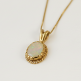 Beautiful 18k Gold Vermeil pendant showcasing an exquisite Oval Natural Fire Ethiopian Opal, ideal for meaningful gifting.