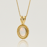 Stunning 18k Gold Vermeil pendant with a vibrant Oval Natural Fire Ethiopian Opal, a symbol of October birthstone charm.