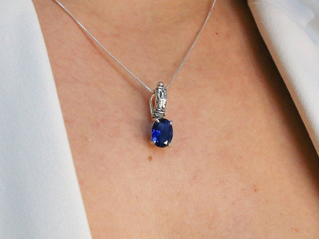 Elegant 925 Sterling Silver Sapphire Pendant with oval Blue Sapphire, perfect for birthdays and special occasions.