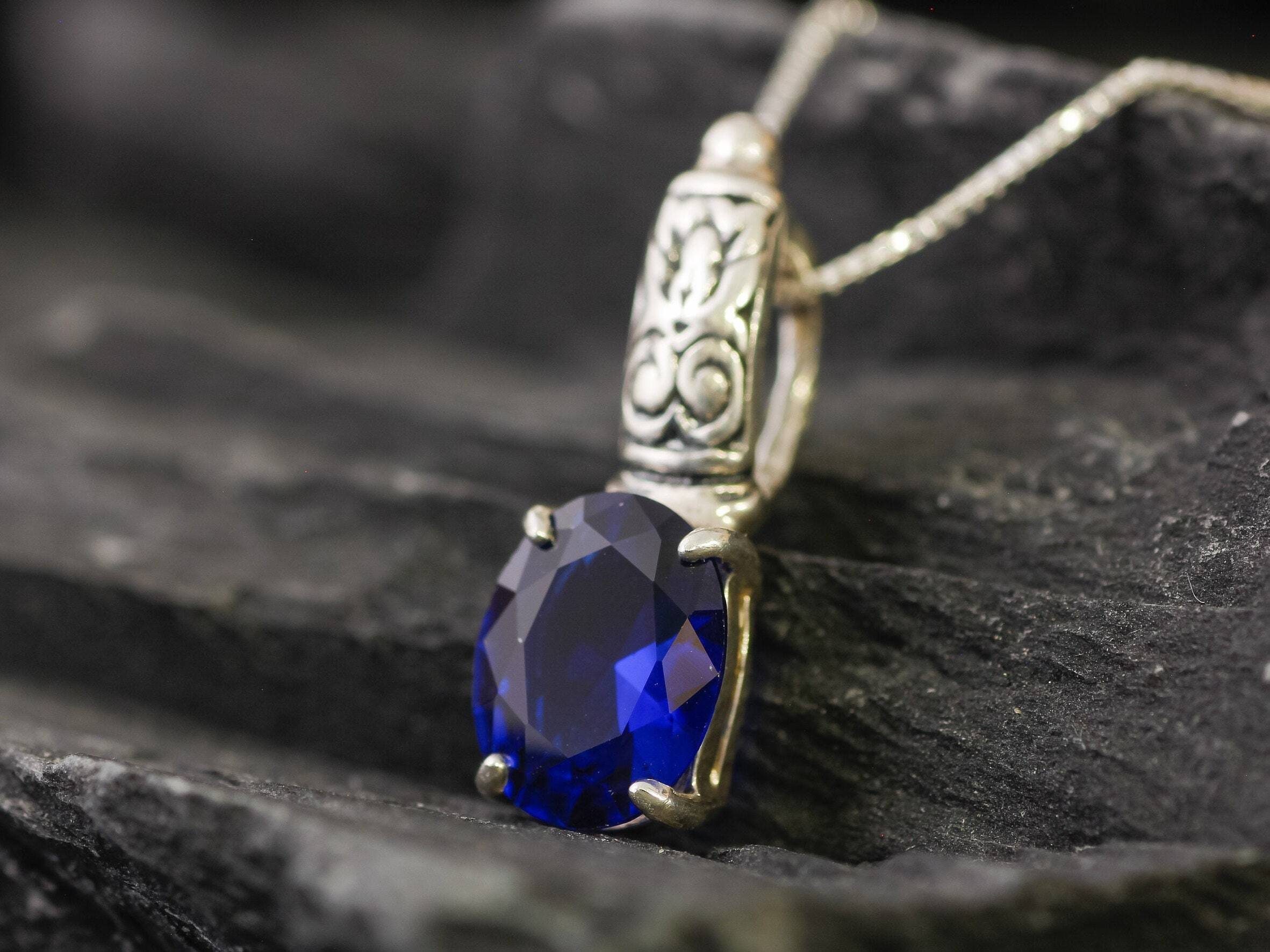 Created Sapphire Pendant made in 925 Sterling Silver with Oval Created Blue Sapphire in Prong setting, September Birthstone gift idea, symbolizes sincerity, truth, and faithfulness, ideal for everyday wear and perfect for birthday gifting and special occasions.