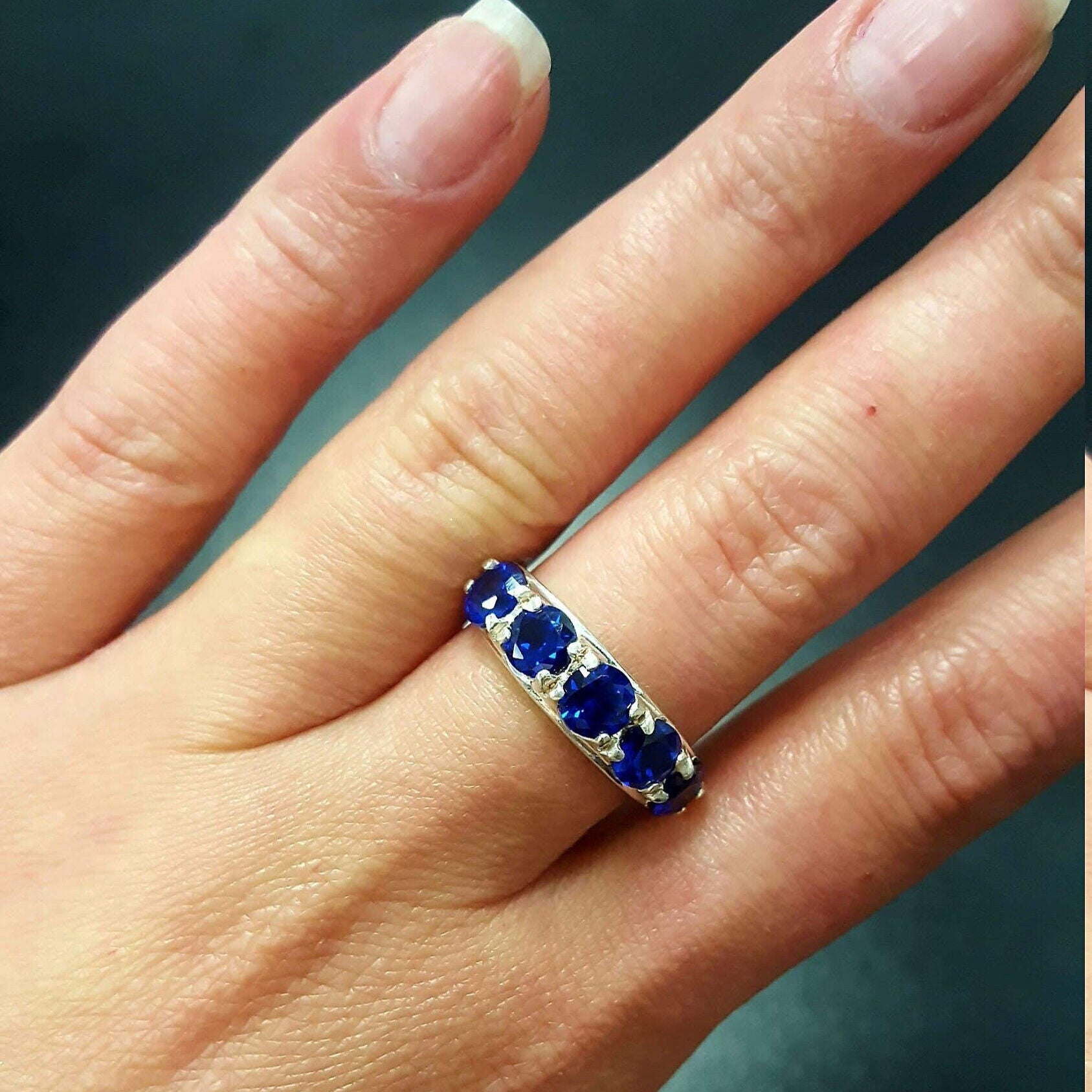 Chic 925 Sterling Silver ring with a vibrant Round Created Blue Sapphire, a beautiful representation of faithfulness and truth.