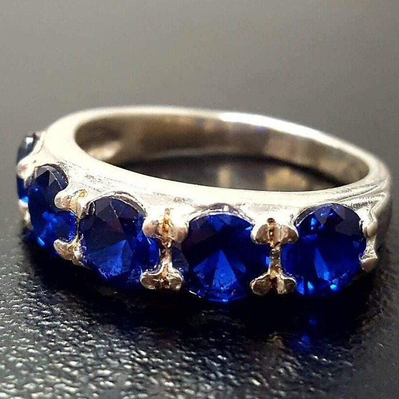 Stunning 925 Sterling Silver prong-set ring with a Created Blue Sapphire, a meaningful gift for September birthdays.