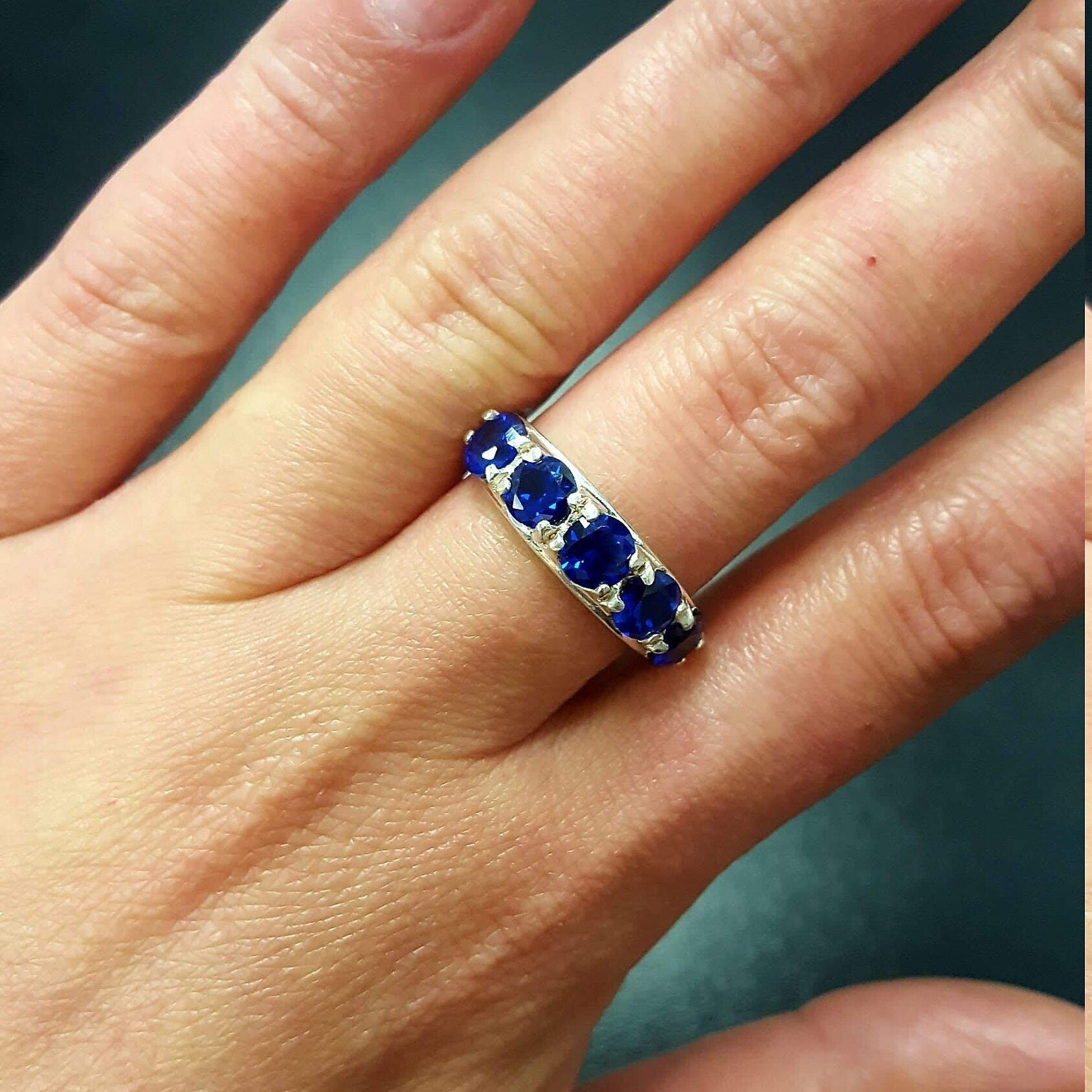 Elegant 925 Sterling Silver ring featuring a Round Created Blue Sapphire, perfect for September birthdays and special occasions.