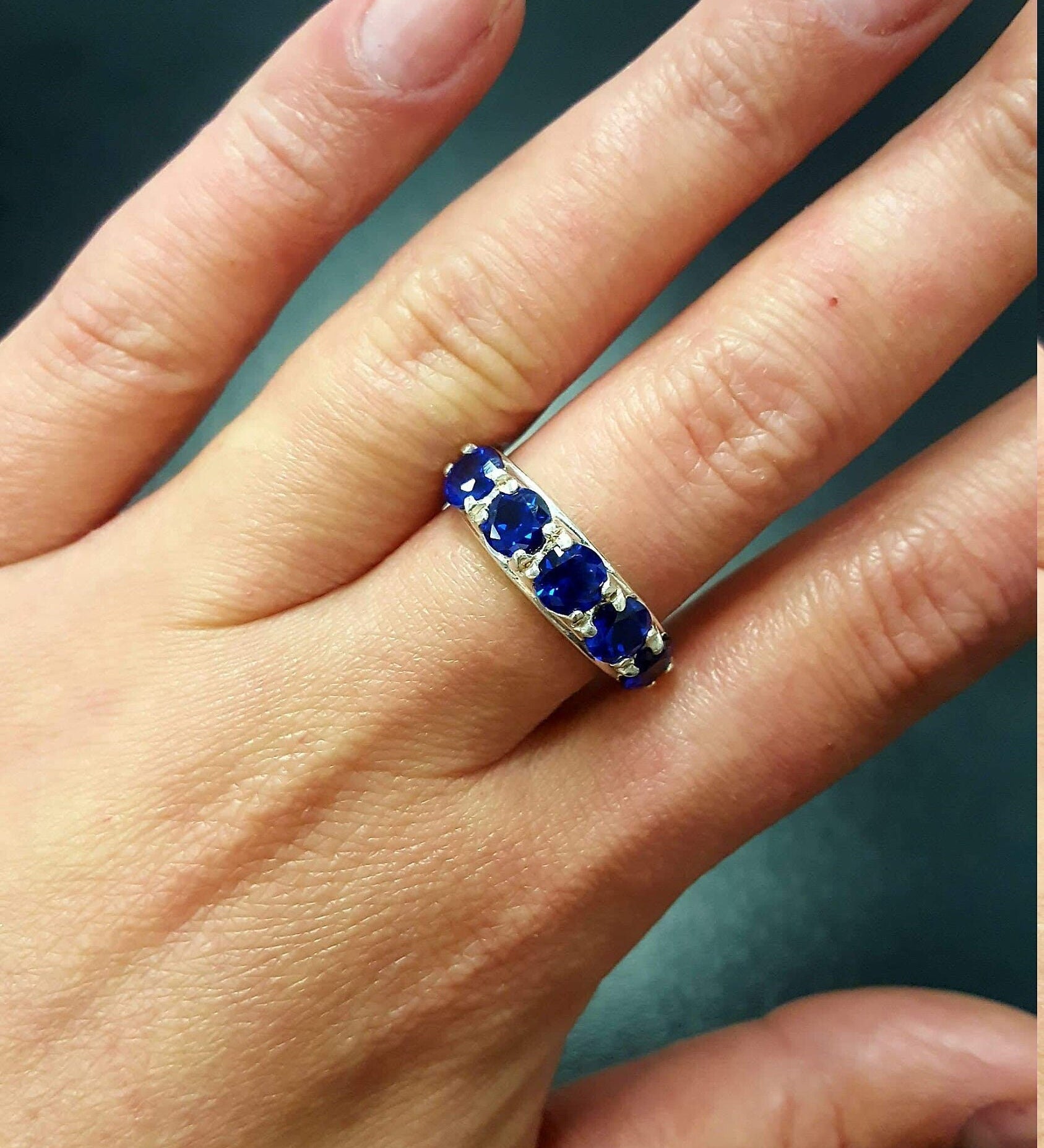 Elegant 925 Sterling Silver ring featuring a Round Created Blue Sapphire, perfect for September birthdays and special occasions.