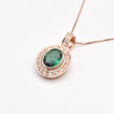 Sleek Rose Gold Vermeil Pendant with Oval Created Green Emerald, a stunning May birthstone gift for any special occasion.
