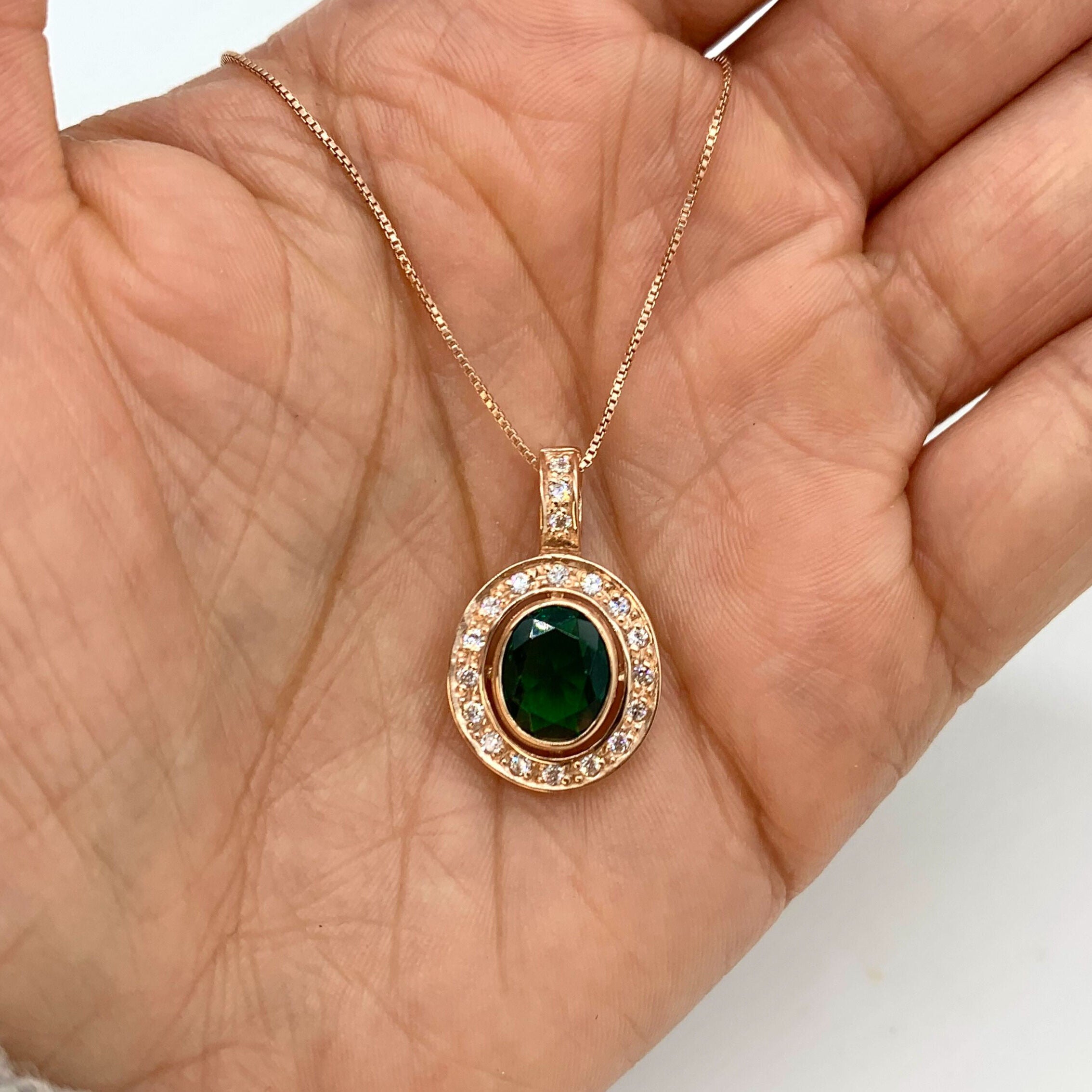 Stunning Rose Gold Vermeil Pendant with Oval Created Green Emerald, a timeless May birthstone accessory for any occasion.
