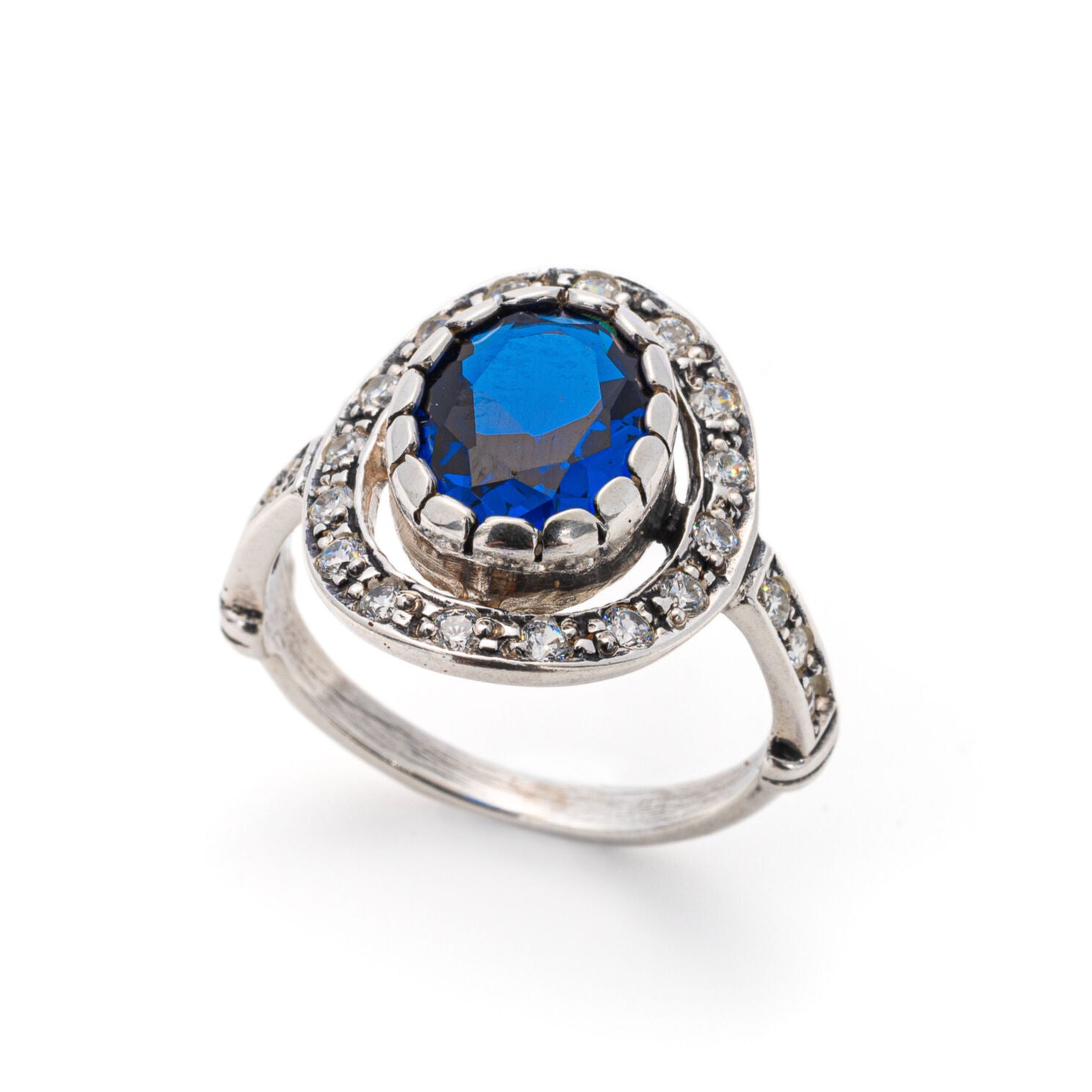 Created Sapphire Ring made in 925 Sterling Silver with Baguette Created Blue Sapphire in Halo setting, September Birthstone gift idea, symbolizes sincerity, truth, and faithfulness, ideal for everyday wear and perfect for birthday gifting and special occasions.