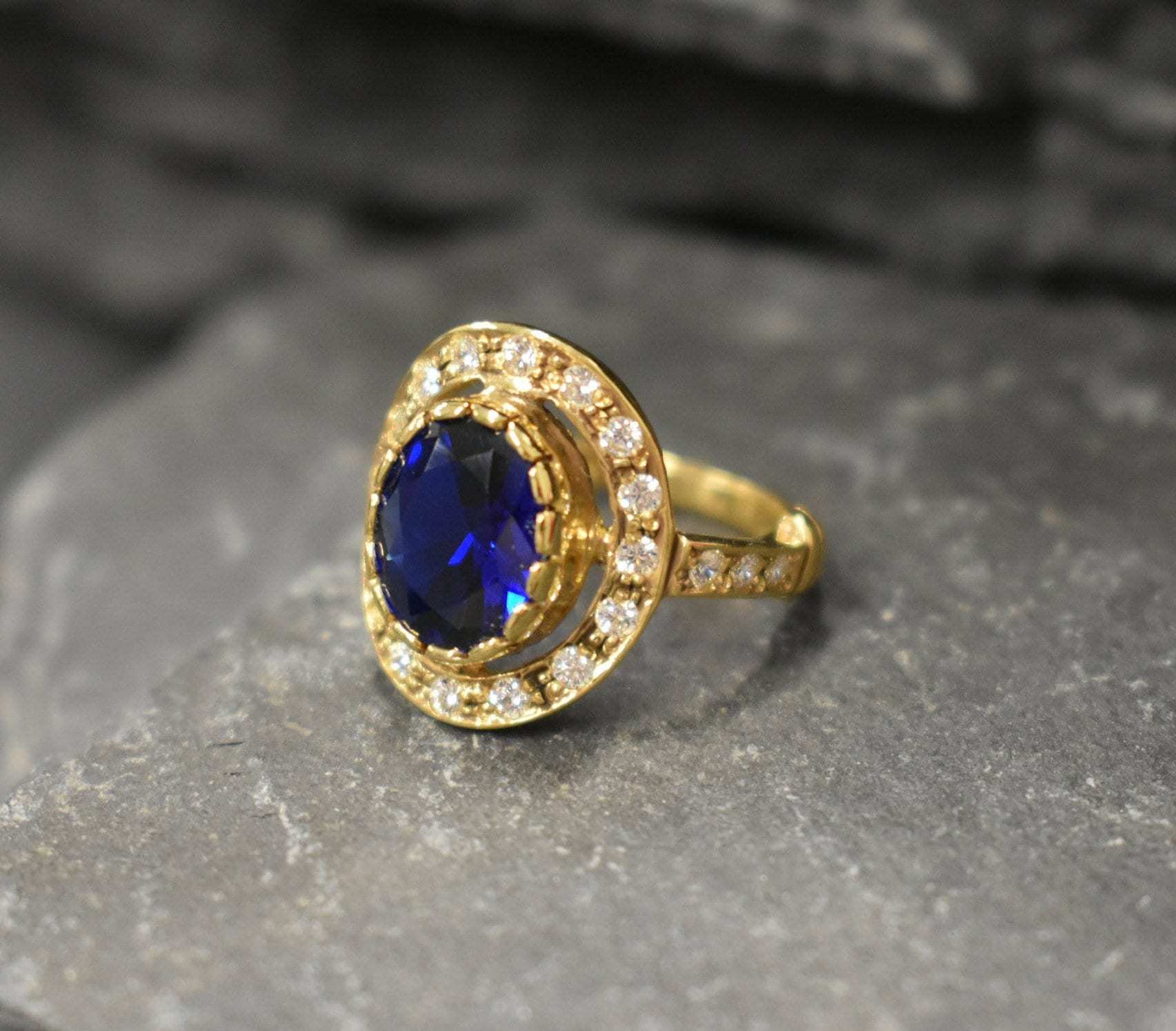 Created Sapphire Ring made in 18k Gold Vermeil with Baguette Created Blue Sapphire in Halo setting, September Birthstone gift idea, symbolizes sincerity, truth, and faithfulness, ideal for everyday wear and perfect for birthday gifting and special occasions.
