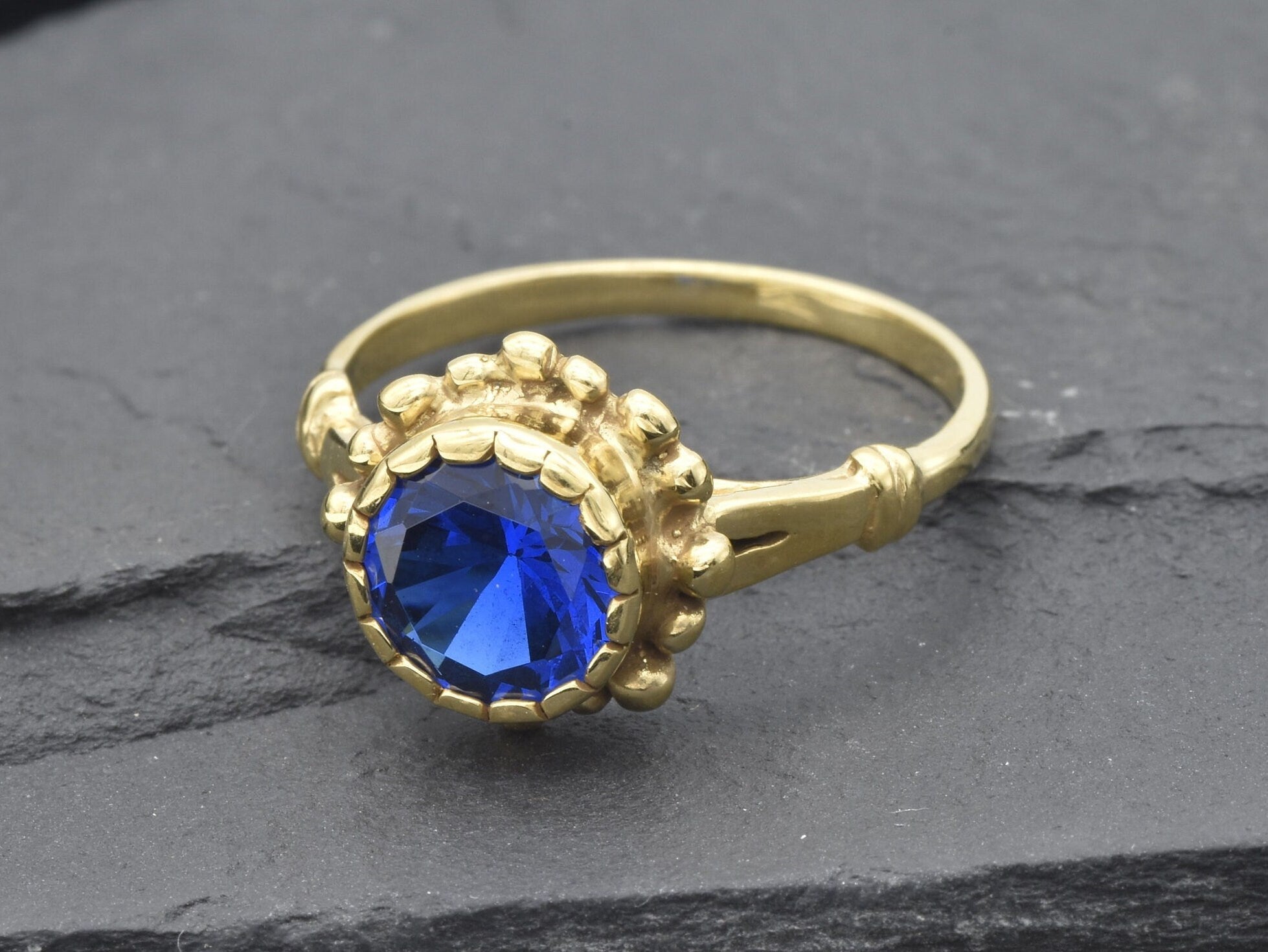 Elegant 18k Gold Vermeil Sapphire Ring featuring a Round Created Blue Sapphire, perfect for birthdays and special occasions.