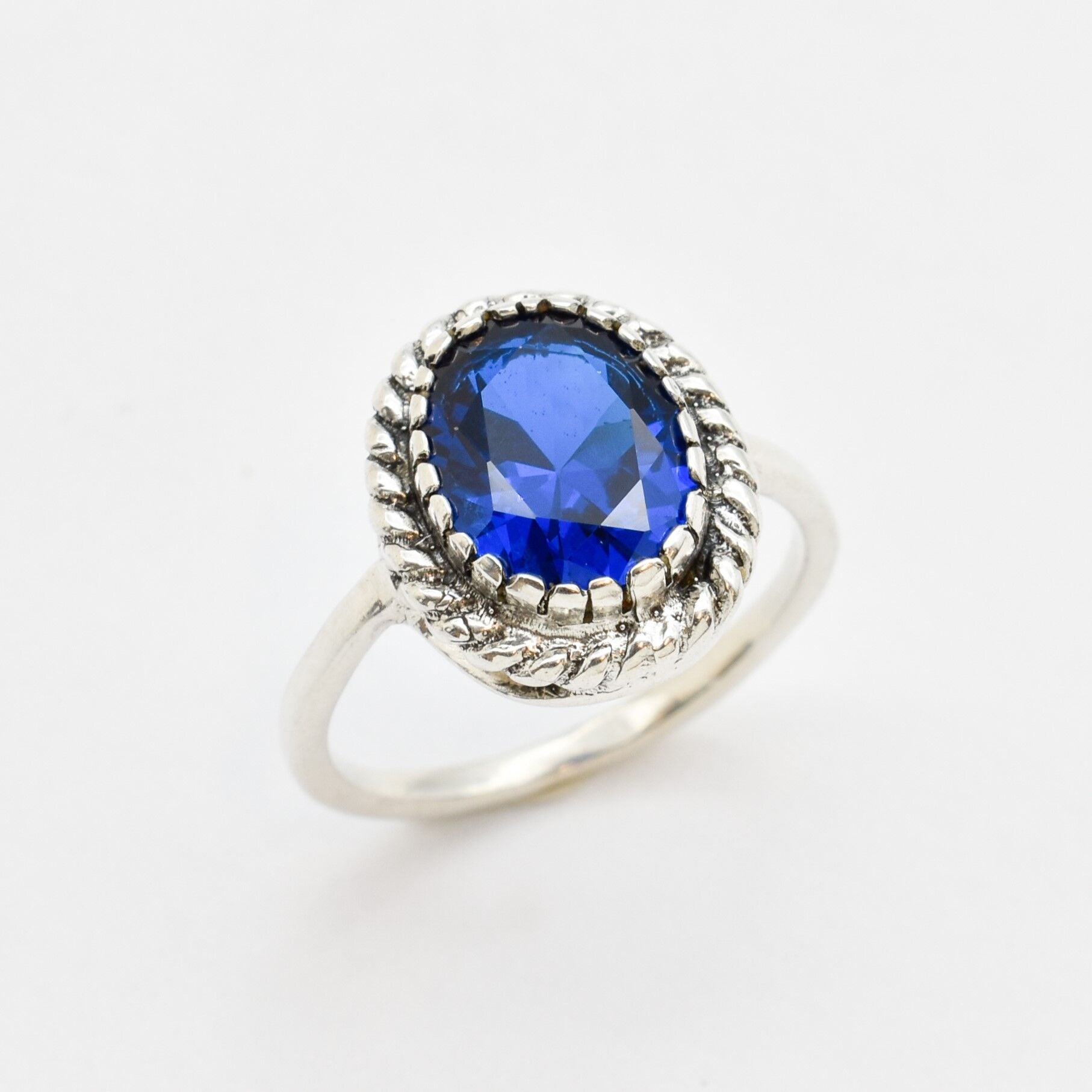 Created Sapphire Ring made in 925 Sterling Silver with Heart Created Blue Sapphire in Solitaire setting, September Birthstone gift idea, symbolizes sincerity, truth, and faithfulness, ideal for everyday wear and perfect for birthday gifting and special occasions.