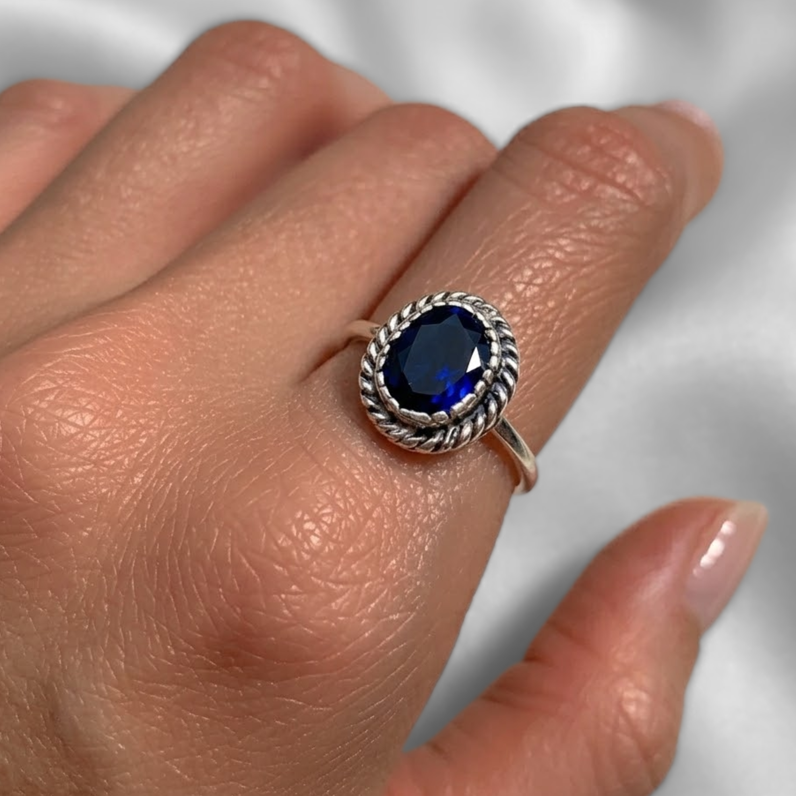Sterling Silver Sapphire Ring featuring a heart-shaped blue sapphire, ideal for birthdays and special occasions.