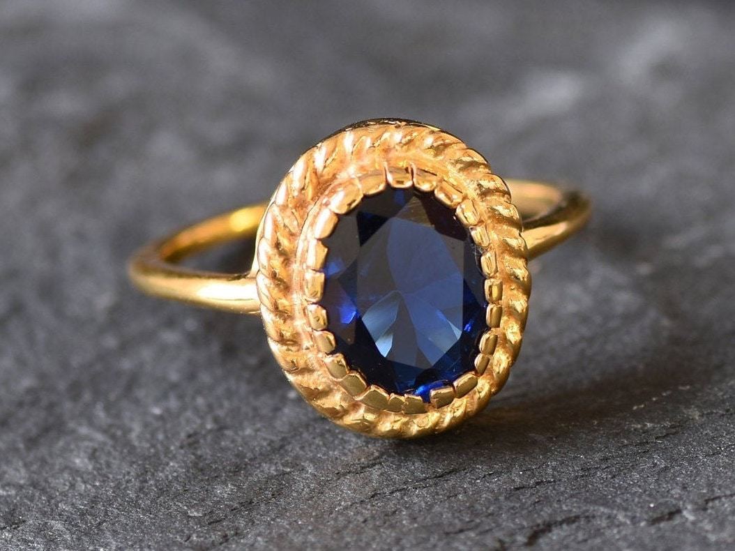 18k Gold Vermeil Created Sapphire Ring, Oval Blue Sapphire in Solitaire, perfect September birthday gift, symbolizes loyalty and truth.