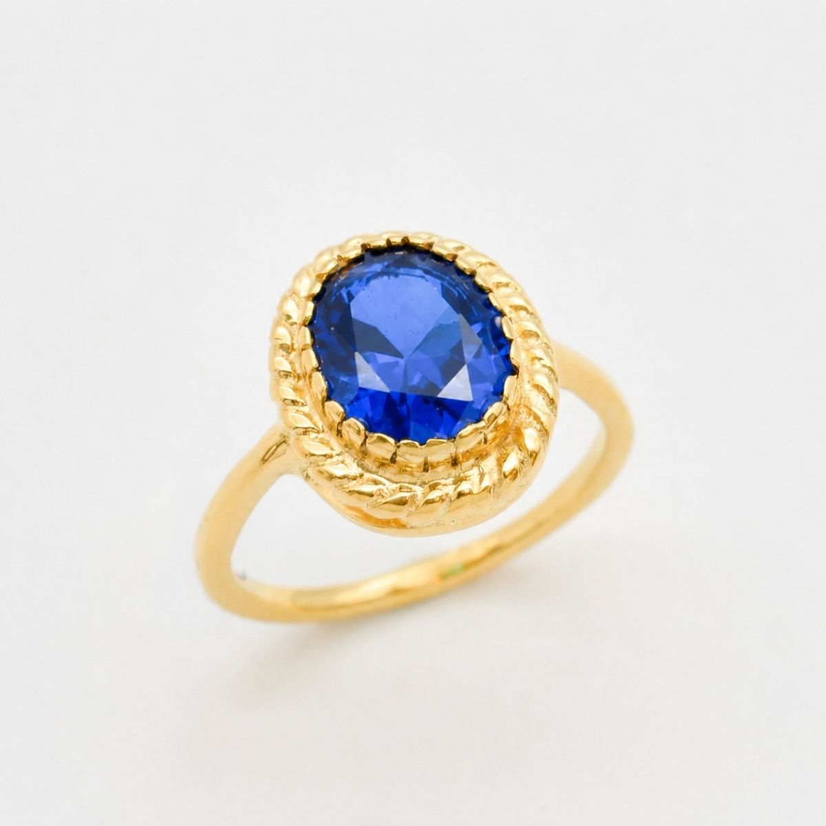 Created Sapphire Ring made in 18k Gold Vermeil with Oval Created Blue Sapphire in Solitaire setting, September Birthstone gift idea, symbolizes sincerity, truth, and faithfulness, ideal for everyday wear and perfect for birthday gifting and special occasions.