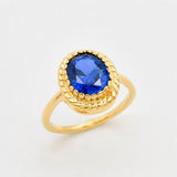 Created Sapphire Ring made in 18k Gold Vermeil with Oval Created Blue Sapphire in Solitaire setting, September Birthstone gift idea, symbolizes sincerity, truth, and faithfulness, ideal for everyday wear and perfect for birthday gifting and special occasions.