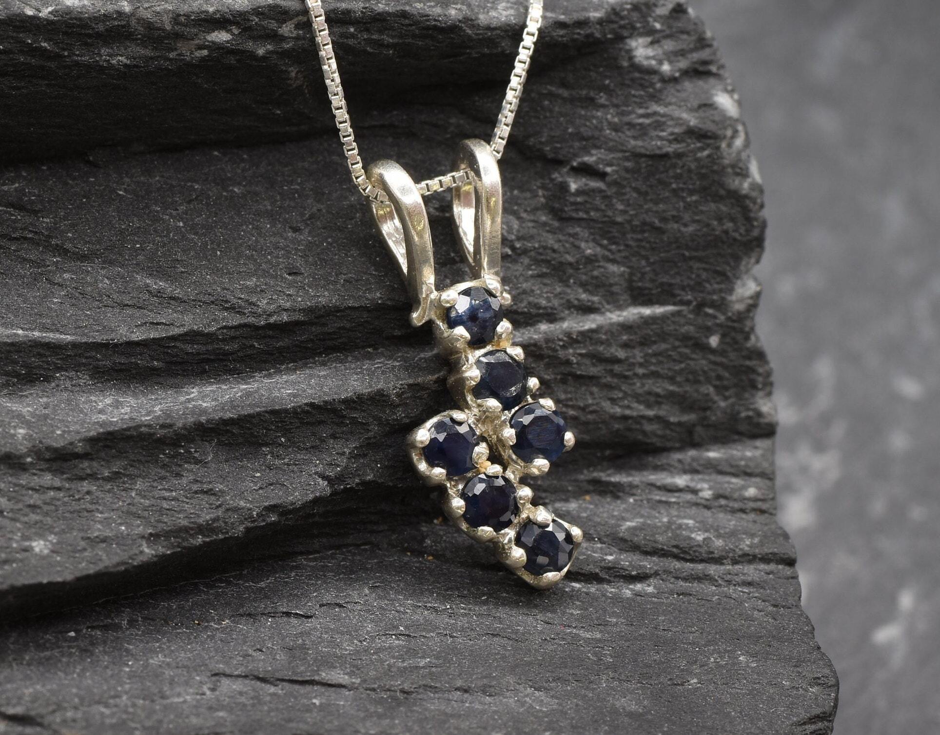 Elegant 925 Sterling Silver pendant featuring a round Natural Blue Sapphire, perfect for September birthdays and special occasions.