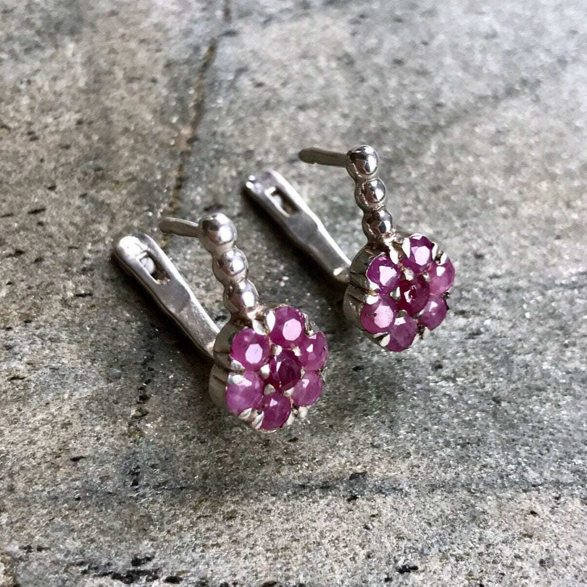 Natural Ruby Earrings made in 925 Sterling Silver with Round Natural Red Ruby in Cluster setting, July Birthstone gift idea, symbolizes nobility, purity, and passion, ideal for everyday wear and perfect for birthday gifting and special occasions.