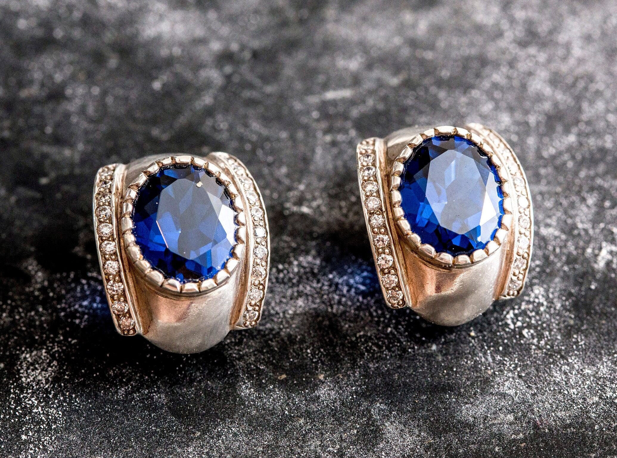 Created Sapphire Earrings made in 925 Sterling Silver with Oval Created Blue Sapphire in Prong setting, September Birthstone gift idea, symbolizes sincerity, truth, and faithfulness, ideal for everyday wear and perfect for birthday gifting and special occasions.