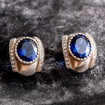 Timeless 925 Sterling Silver Sapphire Earrings with oval blue gemstone, embodying faithfulness, perfect for any occasion.