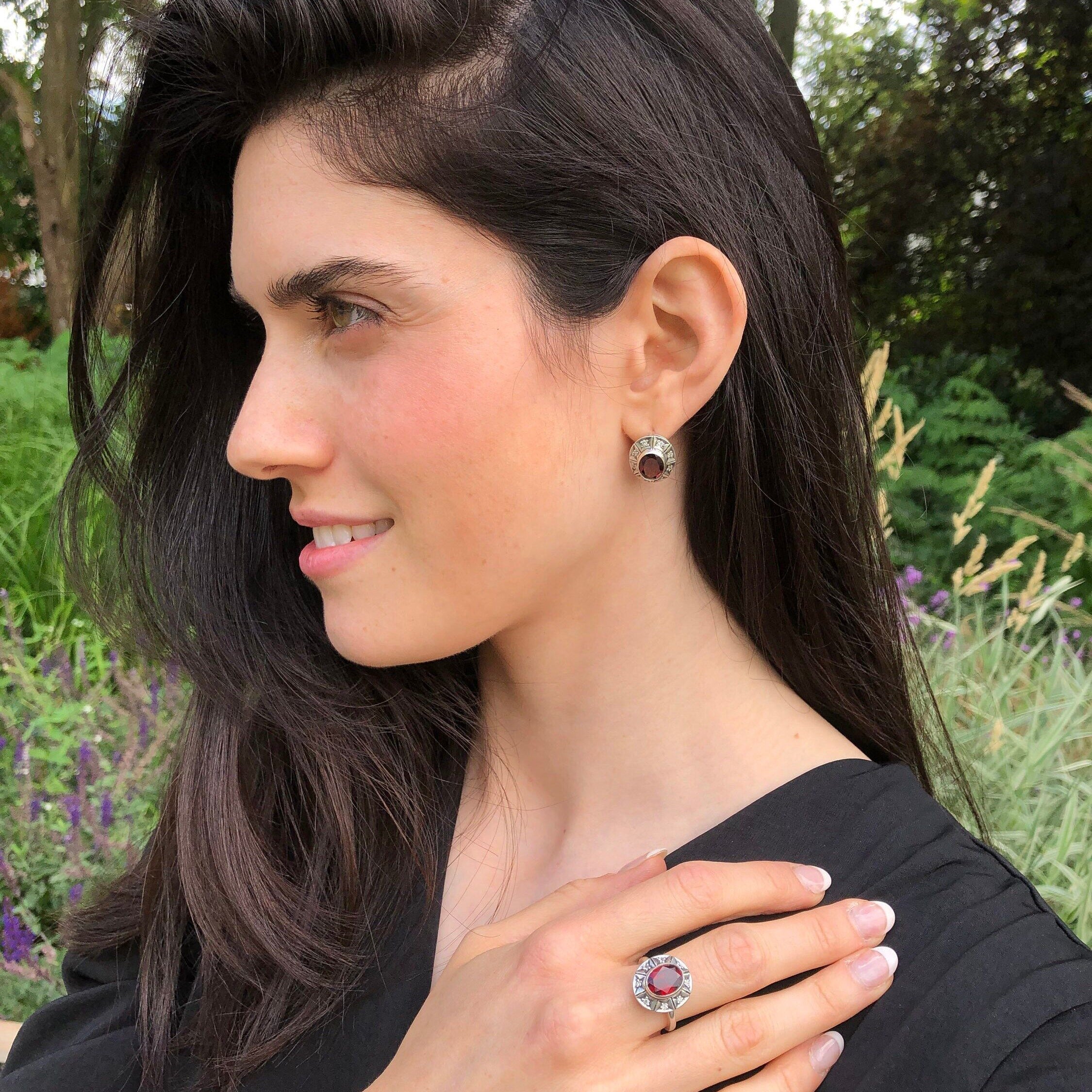 Ruby earrings in 925 Sterling Silver, featuring a stunning oval Ruby in a bezel setting; perfect for July birthdays and special gifts.