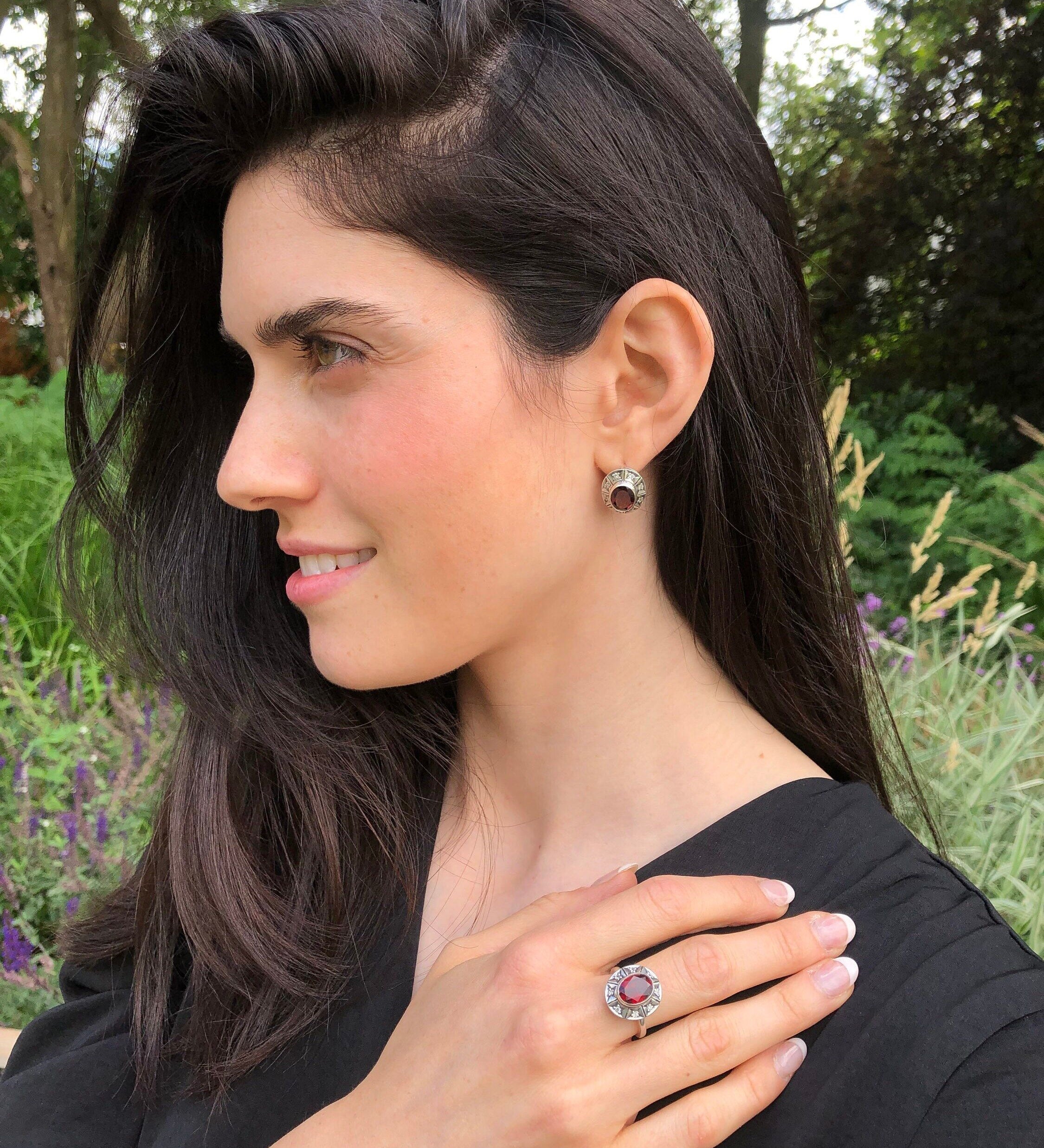 Ruby earrings in 925 Sterling Silver, featuring a stunning oval Ruby in a bezel setting; perfect for July birthdays and special gifts.