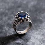 Elegant Created Sapphire Ring in 925 Sterling Silver, symbolizes truth and faithfulness; perfect for special occasions and gifts.