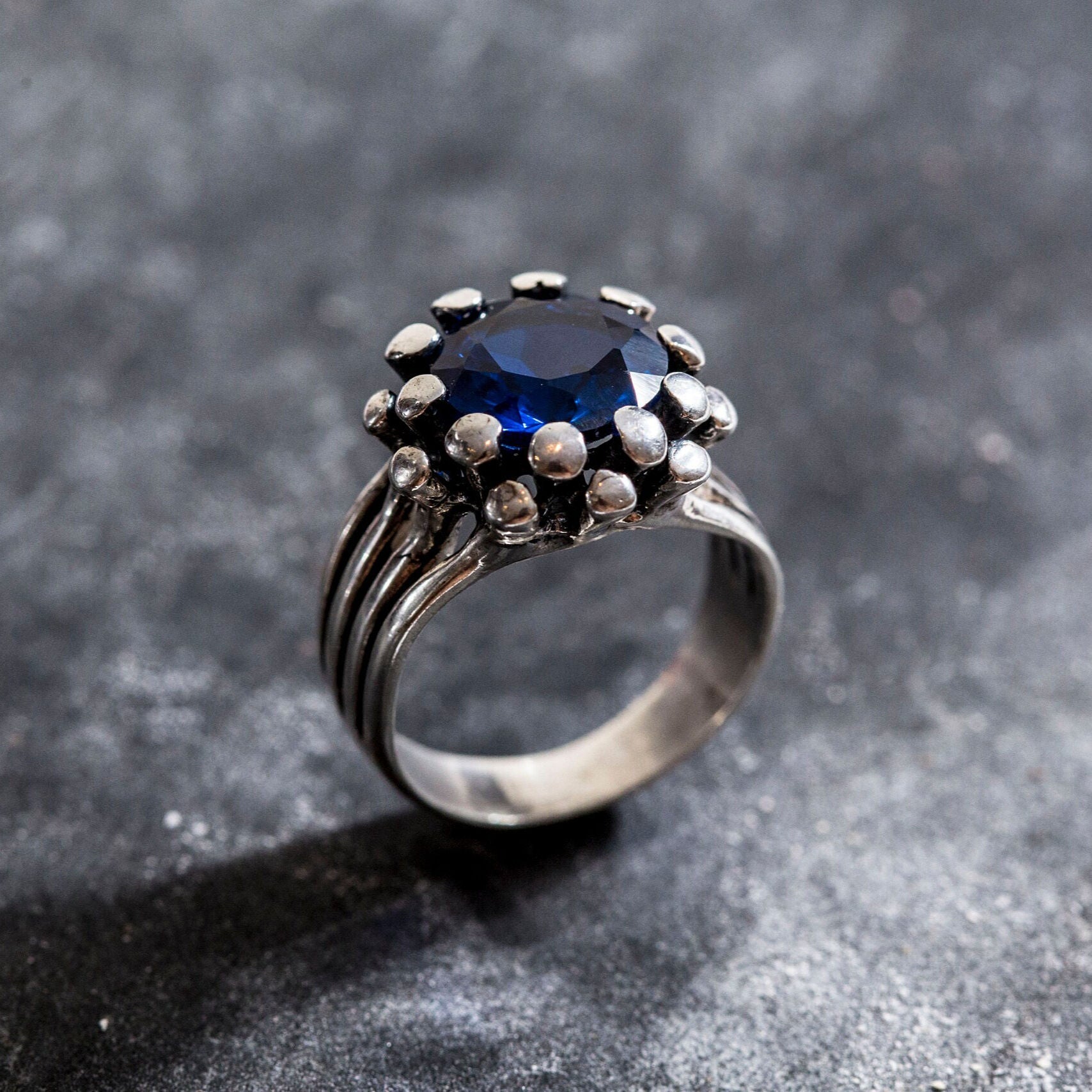 Elegant Created Sapphire Ring in 925 Sterling Silver, symbolizes truth and faithfulness; perfect for special occasions and gifts.