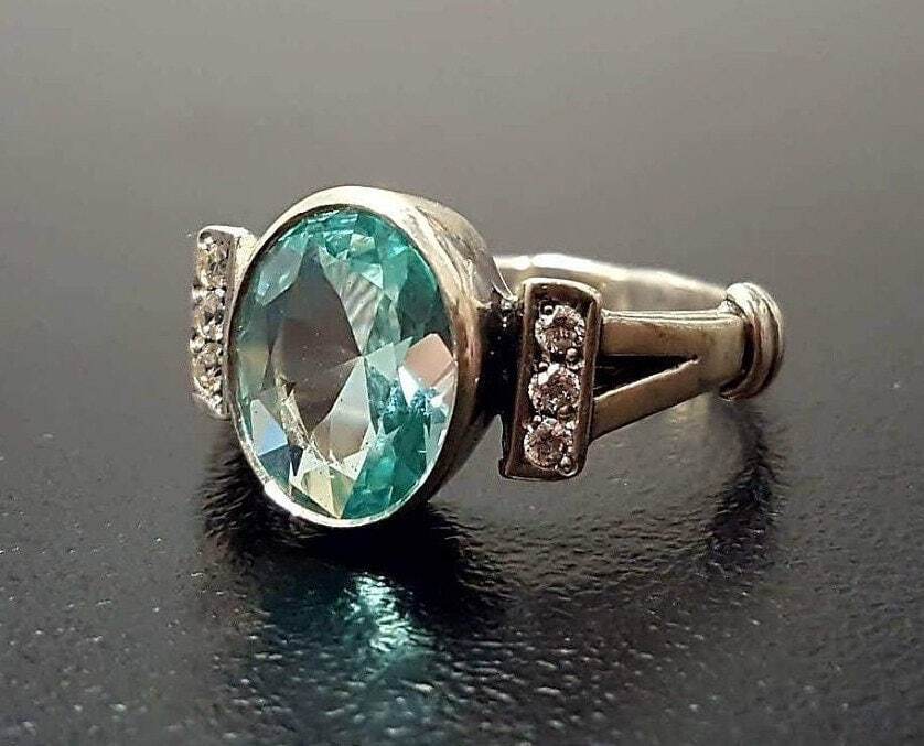 Created Aquamarine Ring made in 925 Sterling Silver with Oval Created Blue Aquamarine in Bezel setting, March Birthstone gift idea, symbolizes courage & good luck, ideal for everyday wear and perfect for birthday gifting and special occasions.
