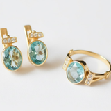 Delicate 18k gold vermeil ring featuring a vibrant oval aquamarine, a meaningful gift for birthdays and everyday wear.