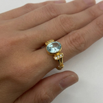 Elegant aquamarine ring in 18k gold vermeil, featuring a bezel-set oval aquamarine, perfect for everyday wear and gifting.